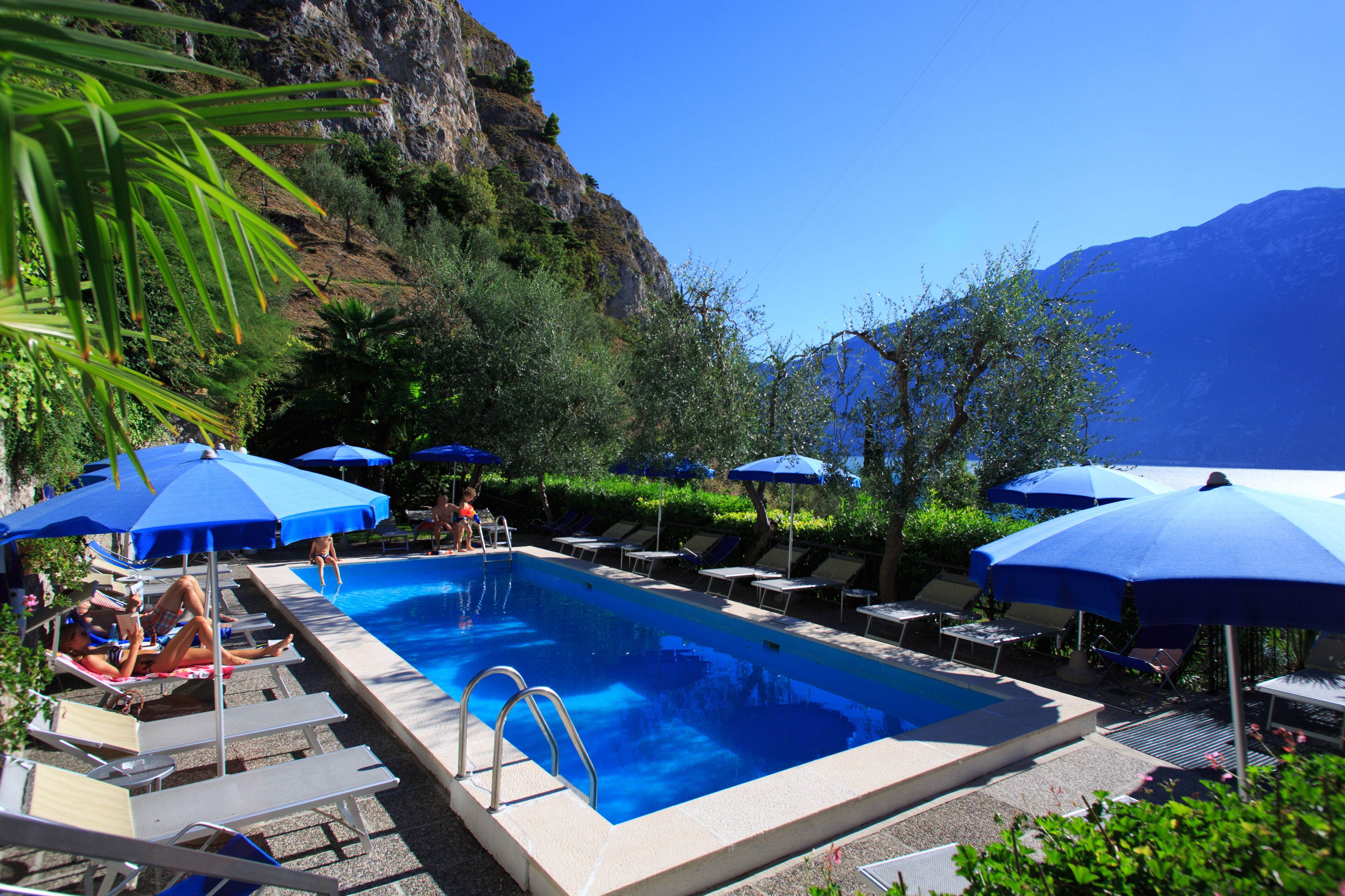 outdoor pool, pool umbrellas, pool loungers