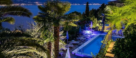 Outdoor pool, pool umbrellas, pool loungers