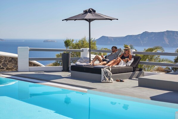 Seasonal outdoor pool, pool umbrellas, sun loungers