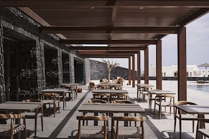 Breakfast, lunch, dinner served; Greek cuisine, pool views