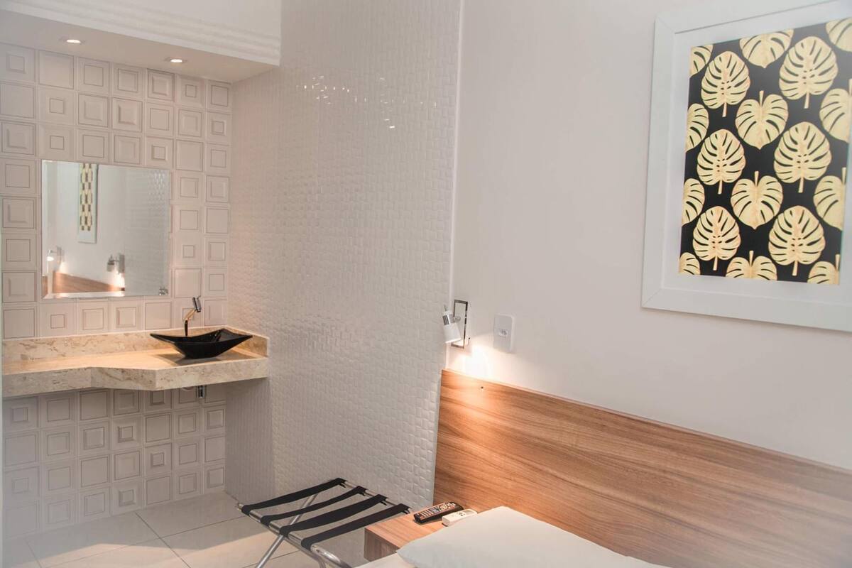 desk, laptop workspace, blackout curtains, iron/ironing board