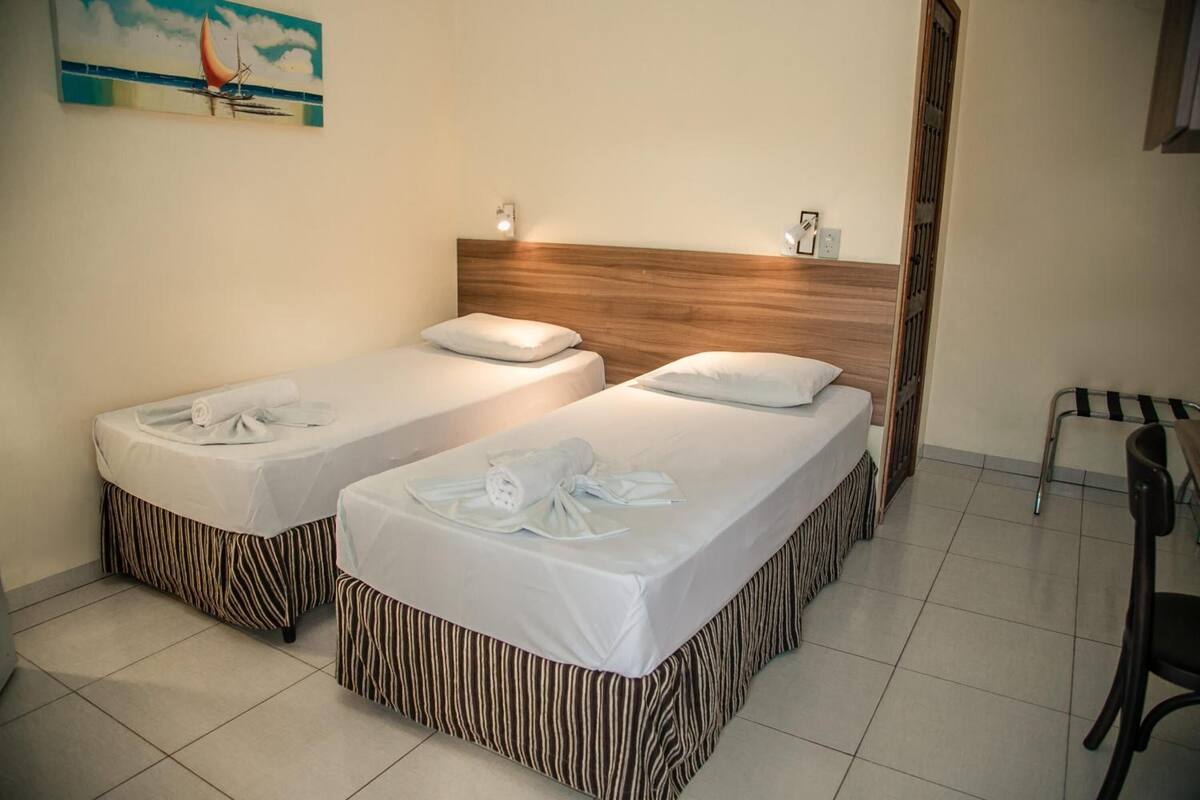 desk, laptop workspace, blackout curtains, iron/ironing board