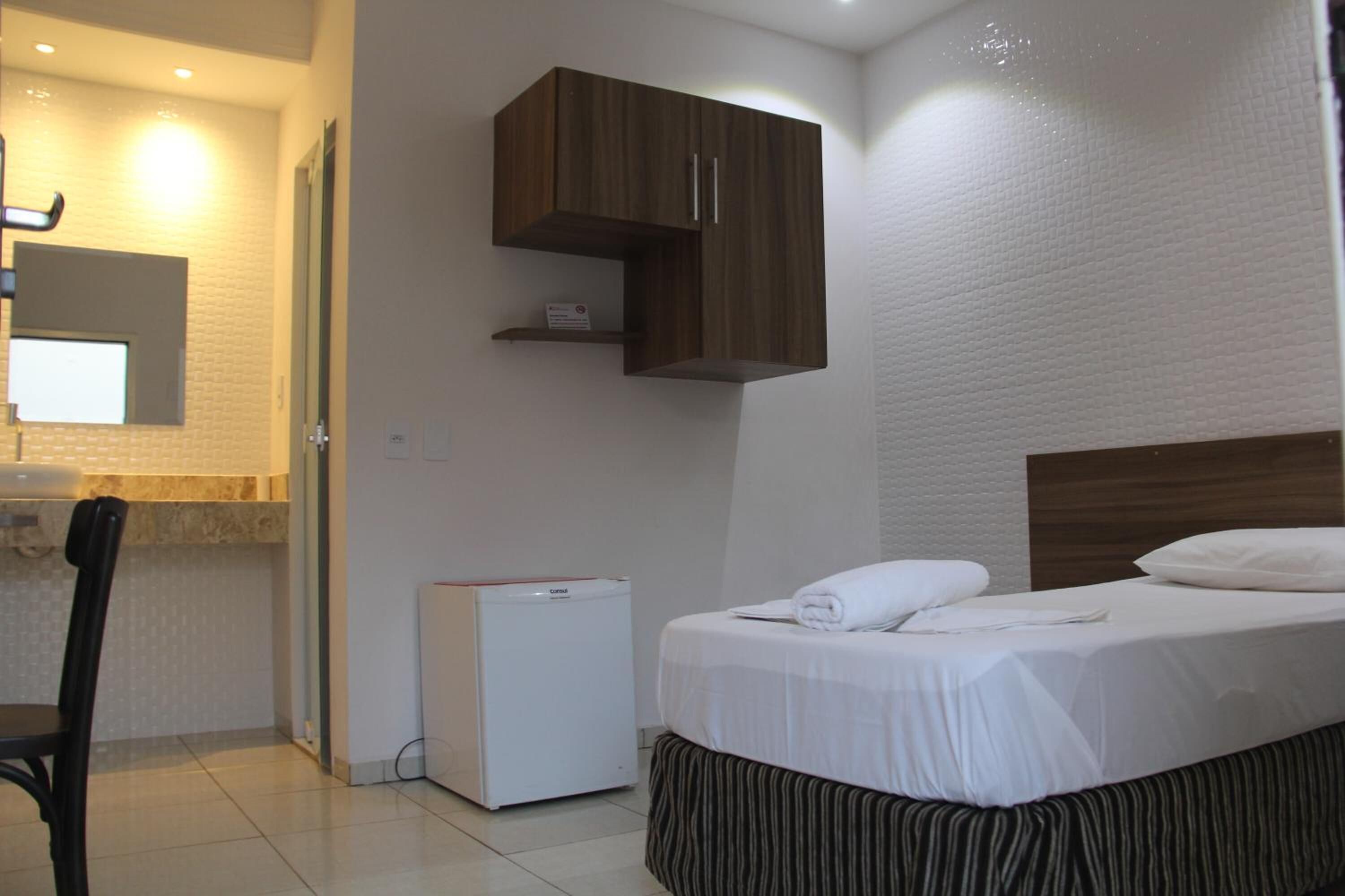 desk, laptop workspace, blackout curtains, iron/ironing board