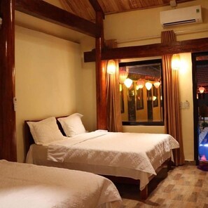 Family Room, Pool View | Individually decorated, individually furnished, desk, laptop workspace - Phong Nha Ecolodge (Bo Trach)