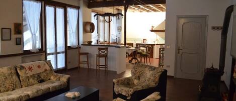 Family Apartment, 1 Bedroom | Living area | Flat-screen TV, toys