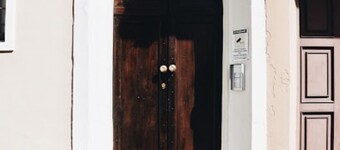 A garden in the shadow of the Torrazzo