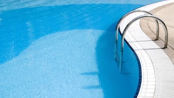 Outdoor pool, pool umbrellas, pool loungers