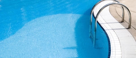 Outdoor pool, pool umbrellas, pool loungers