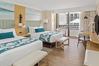Hypo-allergenic bedding, in-room safe, desk, laptop workspace at Opal Grand Oceanfront Resort & Spa