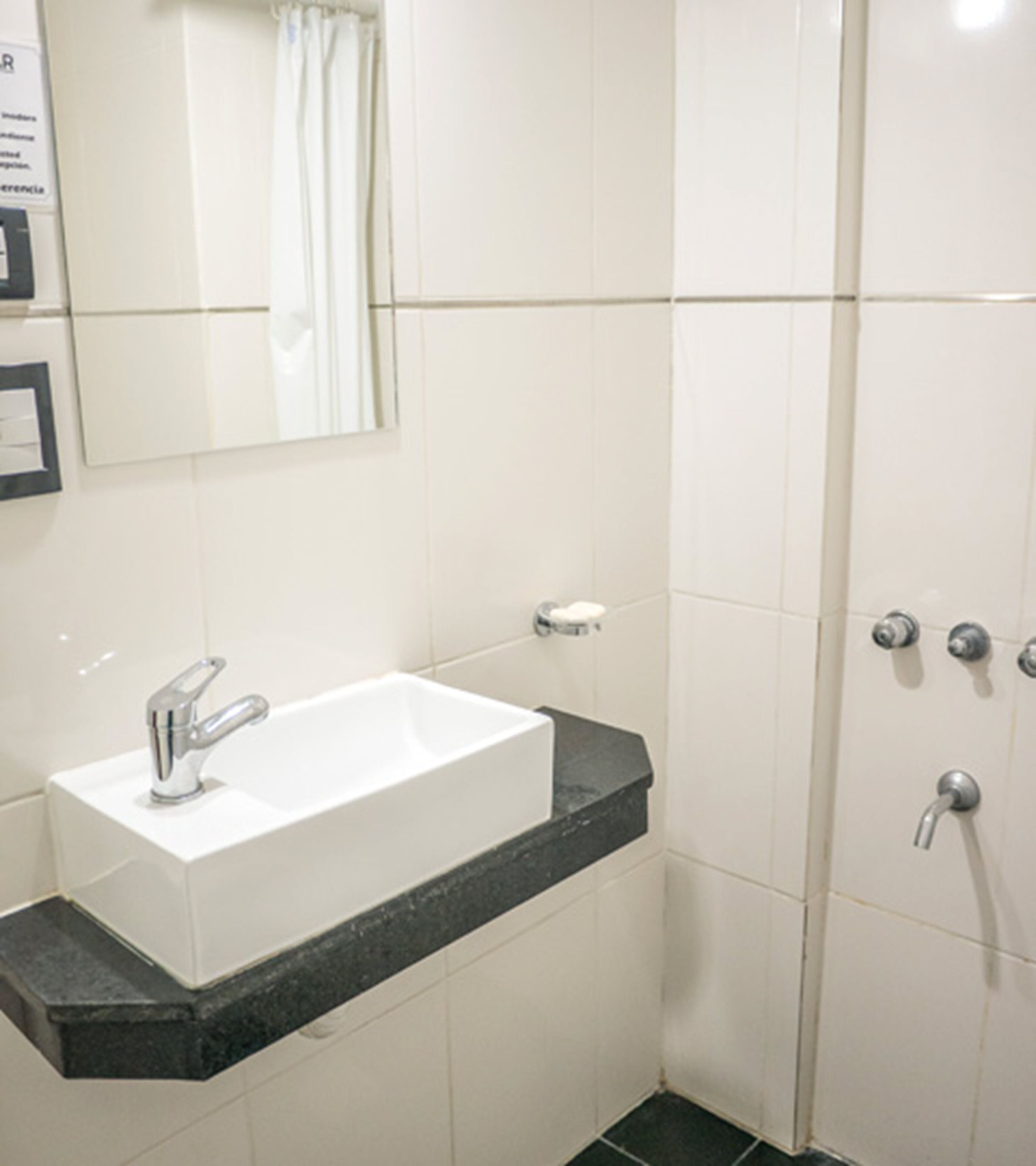 Shower, rainfall showerhead, bidet, towels