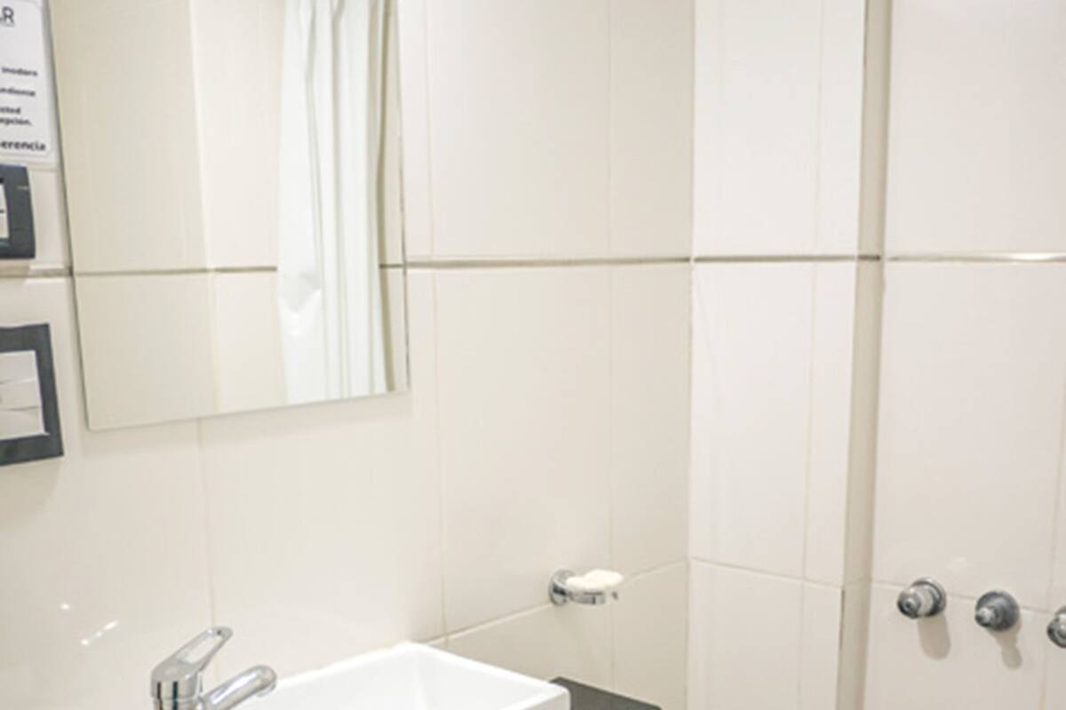 Shower, rainfall showerhead, bidet, towels