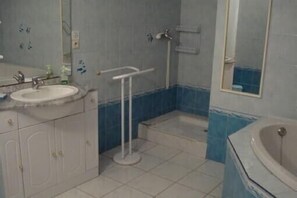 Bathtub, hair dryer, bidet