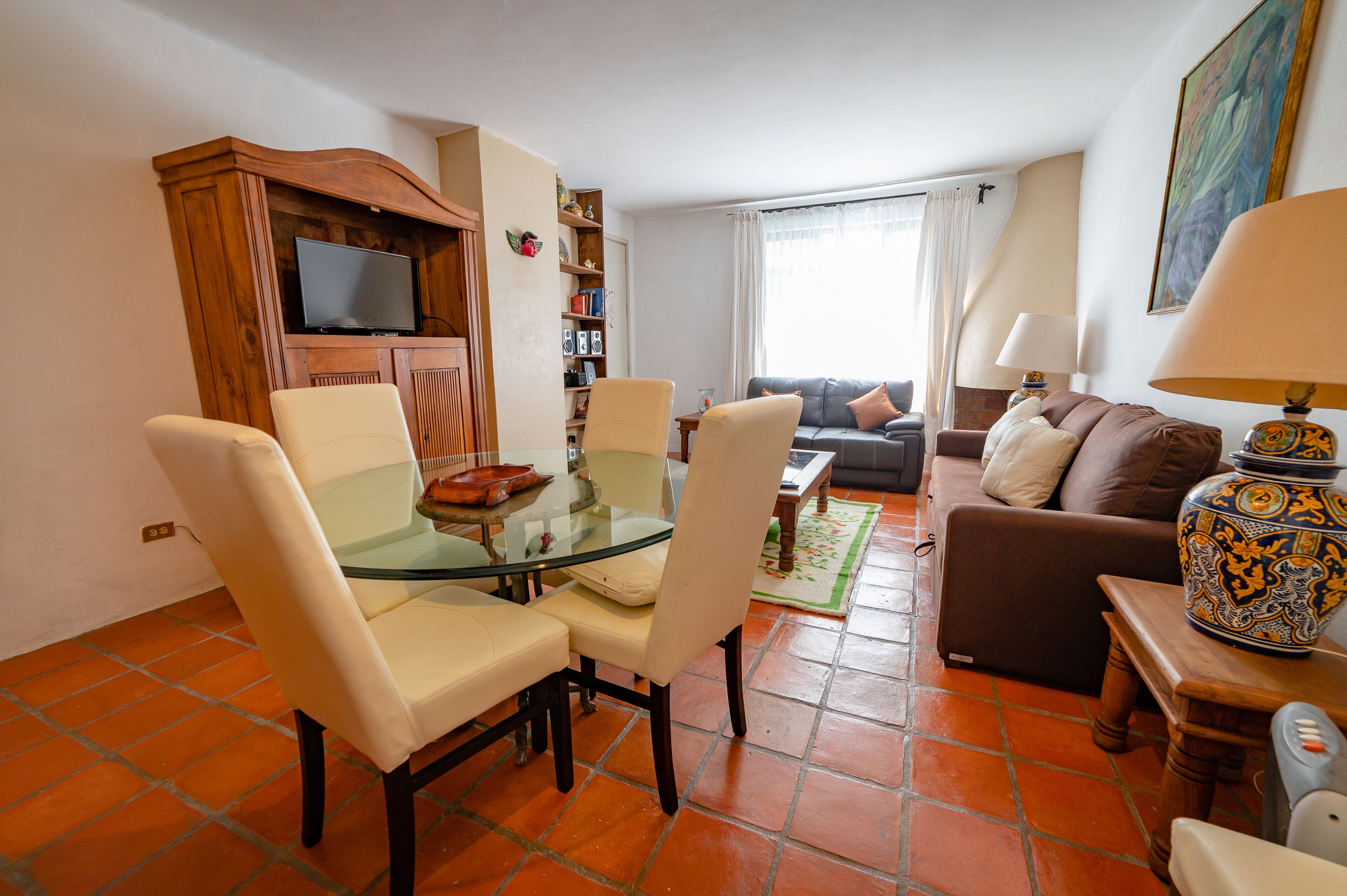 Deluxe Villa | Living room | 40-inch flat-screen TV with digital channels, TV, fireplace