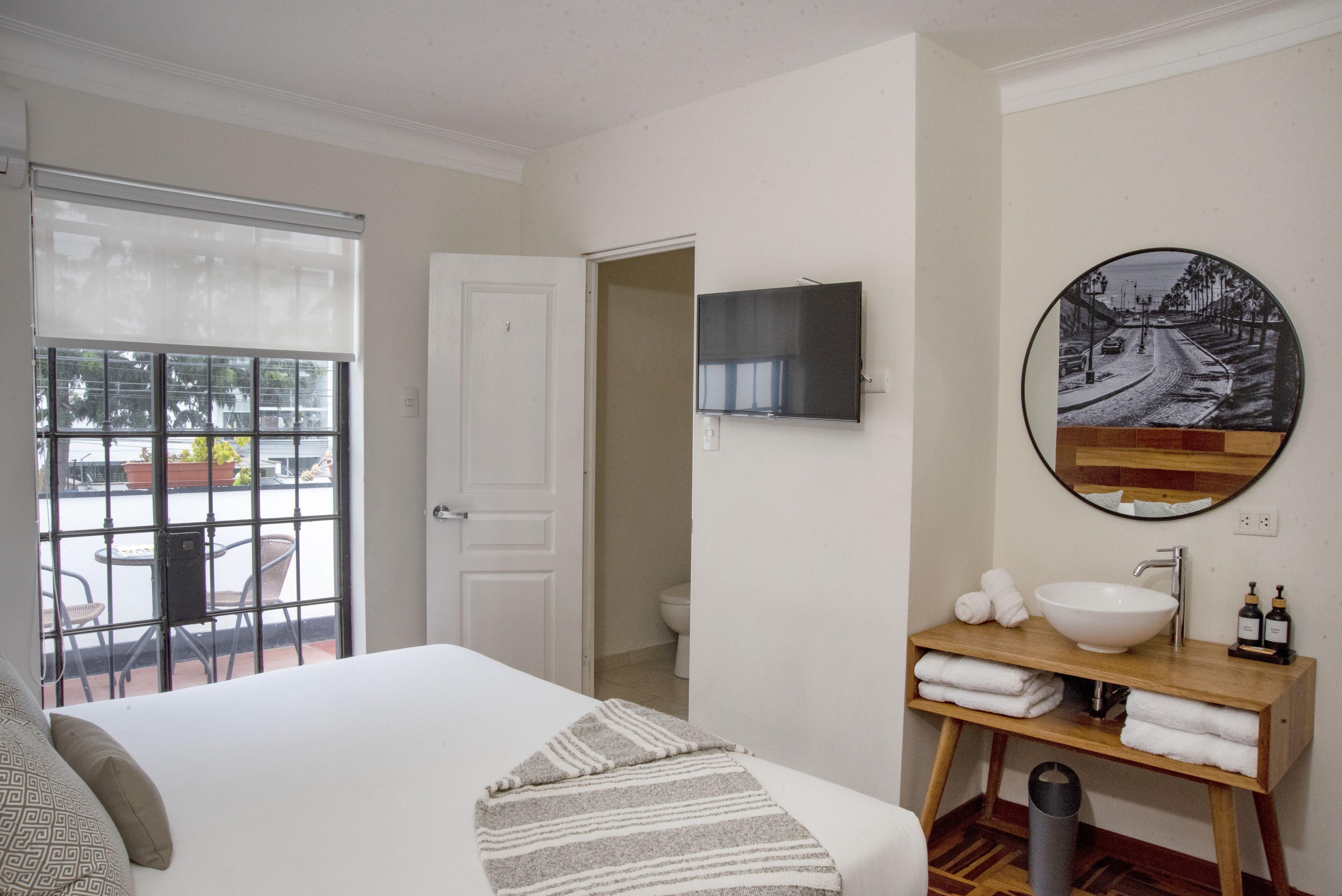 superior double room, 1 king bed, city view | premium bedding, in-room safe, laptop workspace, blackout curtains