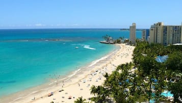 On the beach, sun loungers, beach towels