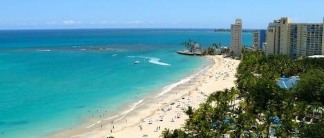 On the beach, sun-loungers, beach towels