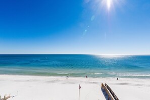 On the beach, sun loungers, beach towels