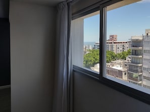 Senior Apartment | Living area | LED TV - Quijano Hotel - Aparts & Suites (Montevideo)