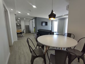 Exclusive Apartment | Living area | LED TV - Quijano Hotel - Aparts & Suites (Montevideo)
