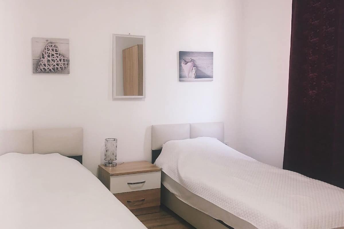 Apartment, 2 Bedrooms | In-room safe, laptop workspace, WiFi (free), bed sheets