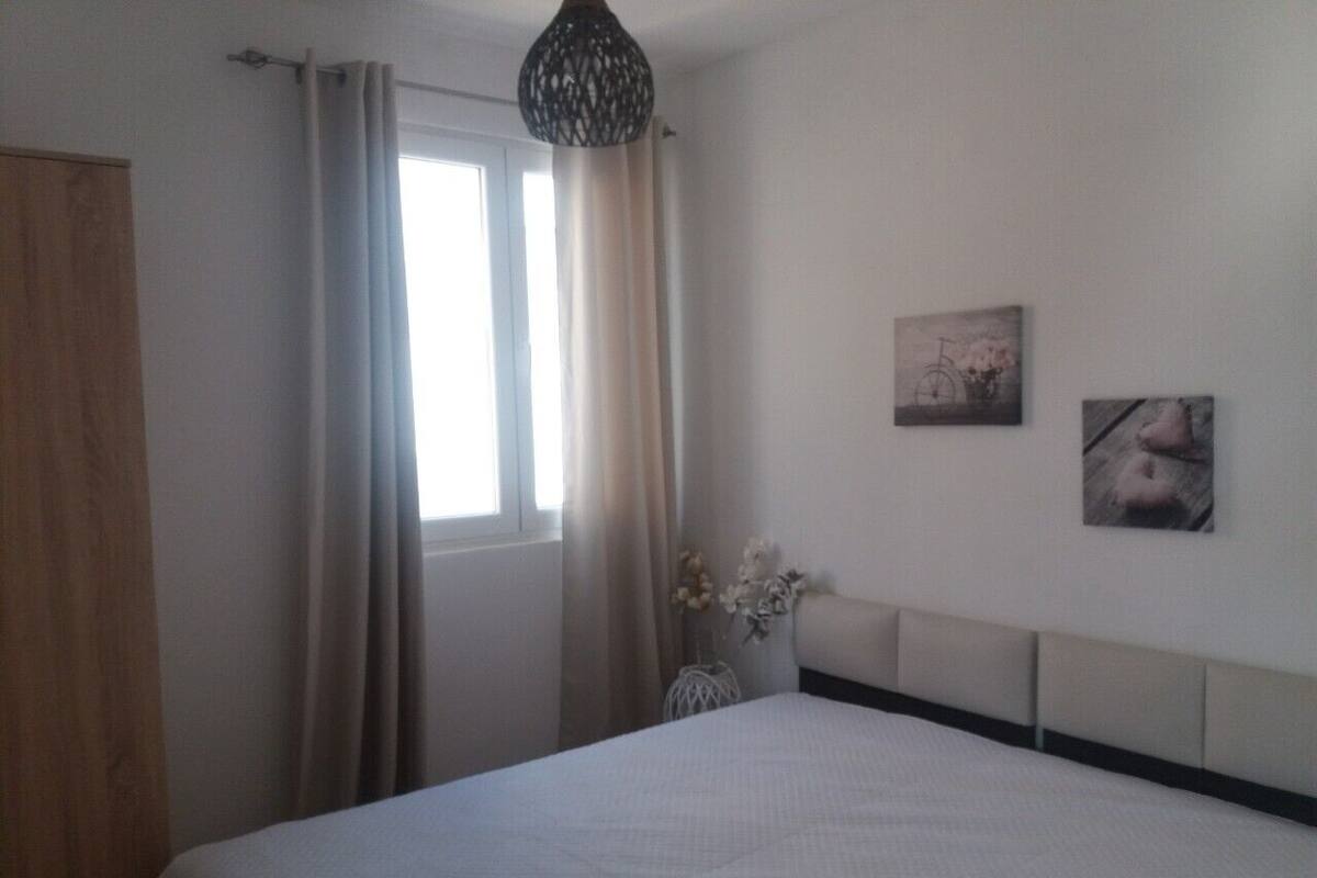 Apartamento, 2 quartos (1) | 2 quartos, cofres nos quartos, espaço de trabalho para notebook