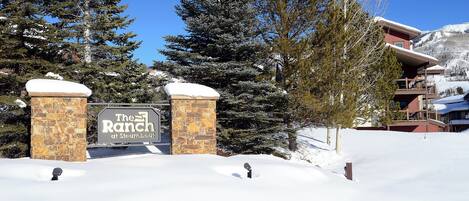 A snow-covered entrance with a sign reading "The Ranch at Steamboat."