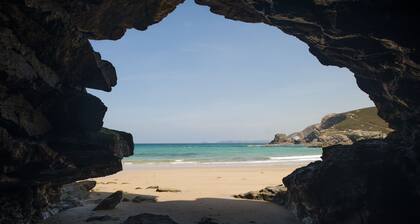 This exceptional, timber framed eco-lodge boasts magnificent coastal views.