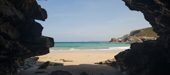 This exceptional, timber framed eco-lodge boasts magnificent coastal views.