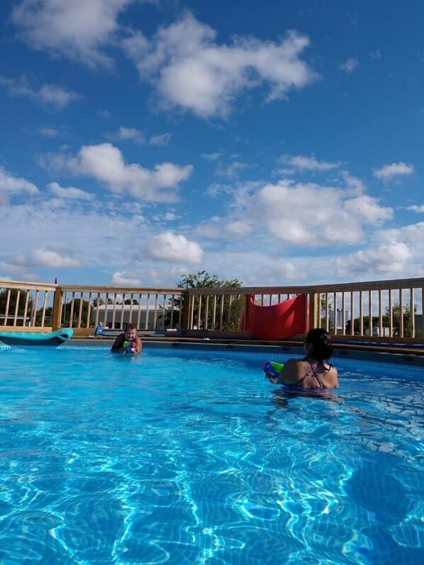 Outdoor pool, free cabanas, pool umbrellas