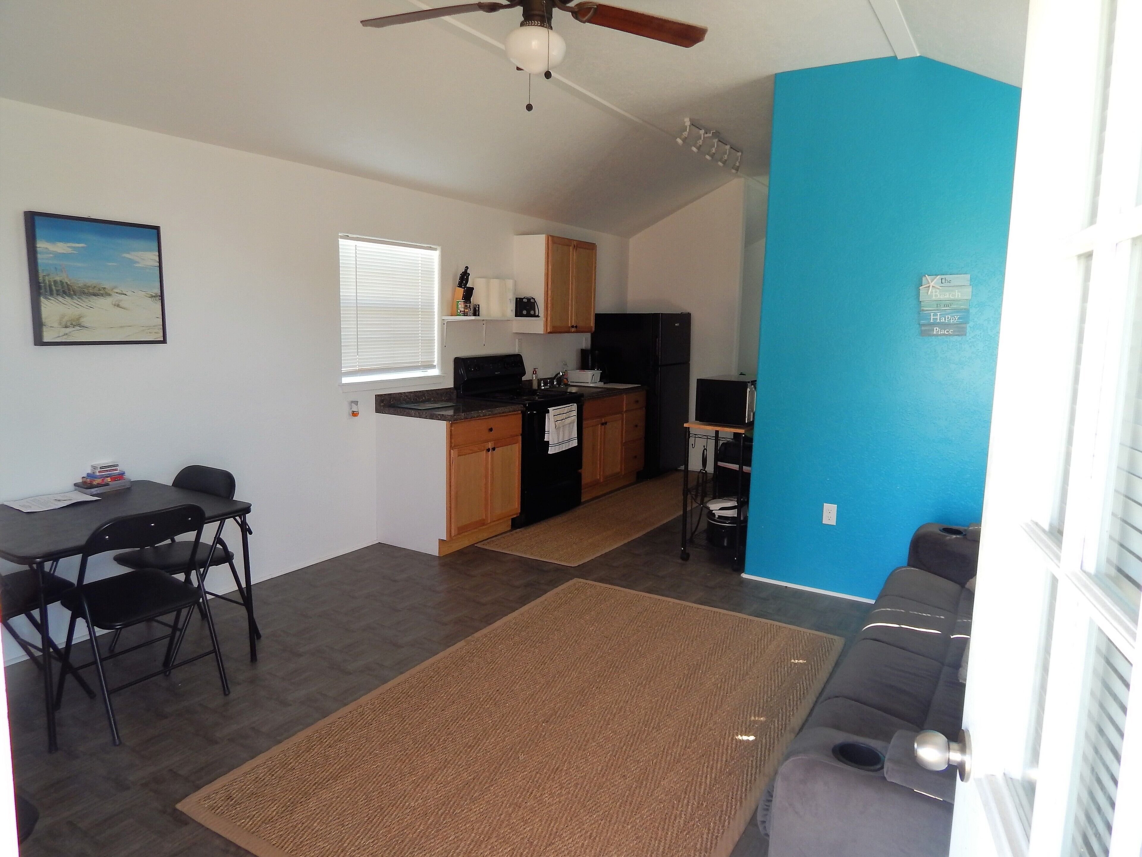 Basic Cabin, 1 Bedroom (Fishin Mission) | Living room | Flat-screen TV