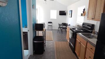 Basic Cabin, 1 Bedroom (Fishin Mission) | Living area | Flat-screen TV