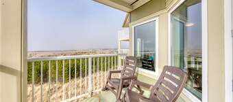 Dog-friendly oceanfront condo with electric fireplace - walk to the beach