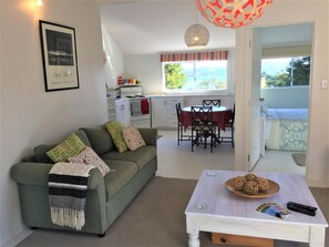 Design Cottage | Living area | 32-inch flat-screen TV with satellite channels, TV, toys - Studio 531 (Coromandel)