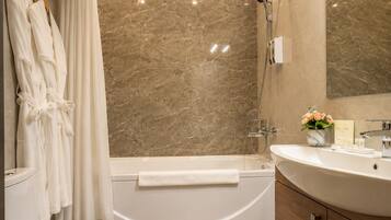 Economy Twin Room | Bathroom | Rainfall showerhead, hair dryer, slippers, towels