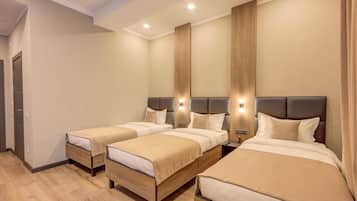 Standard Triple Room | Premium bedding, down comforters, minibar, desk