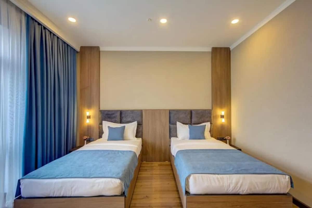 Economy Twin Room | Premium bedding, down duvets, minibar, desk