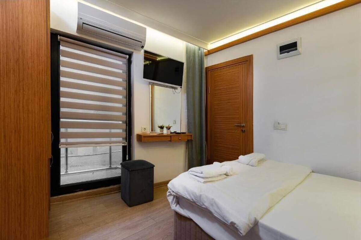 Minibar, safe på rommet, lydisolert og strykejern/-brett