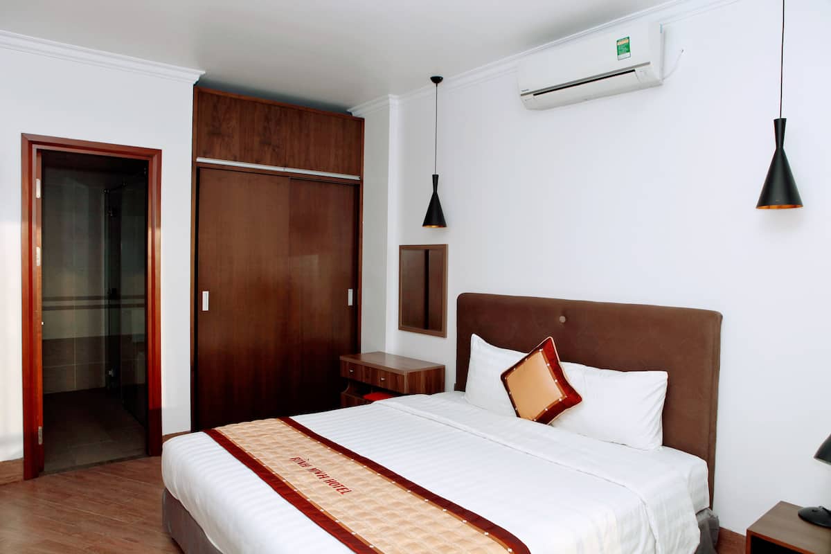 Deluxe-studiolejlighed - tekøkken | Senge med madrasser af memory foam, minibar, skrivebord, gratis Wi-Fi