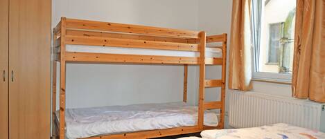 2 bedrooms, travel crib, WiFi, bed sheets