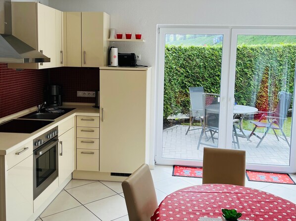 Fridge, oven, dishwasher, high chair