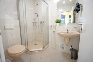 Regadera y secadora de cabello 