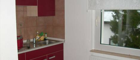 Fridge, toaster, high chair
