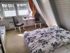 2 habitaciones, tabla de planchar con plancha, cuna de viaje y wifi