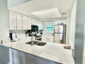 Fridge, microwave, dishwasher, coffee/tea maker