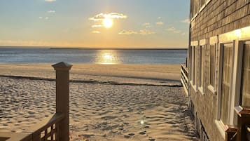 On the beach, sun-loungers
