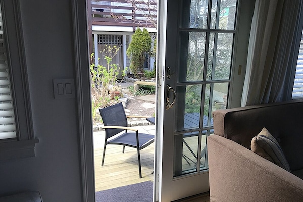 Living area and exit to the deck.