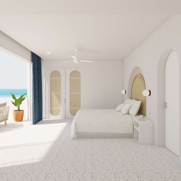 A modern bedroom with a bed, a ceiling fan, a potted plant, and a view of the ocean.