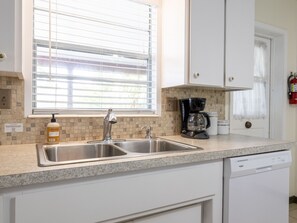 Fridge, microwave, oven, stovetop - Bollinger Duplex A Pet Friendly 2 Bedroom One Block From Beach (Holmes Beach)