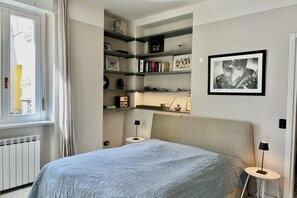 1 dormitorio, tabla de planchar con plancha, wifi y ropa de cama