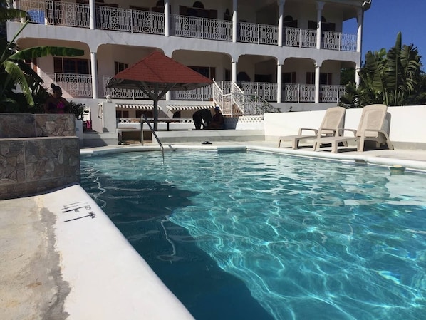 Outdoor pool, sun loungers